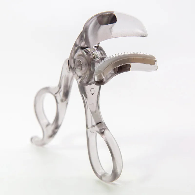 Portable eyelash curler with integrated comb, wide clip design, shaping tool for natural, lasting curl. Compact beauty accessory ensures effortless styling and professional grooming results.